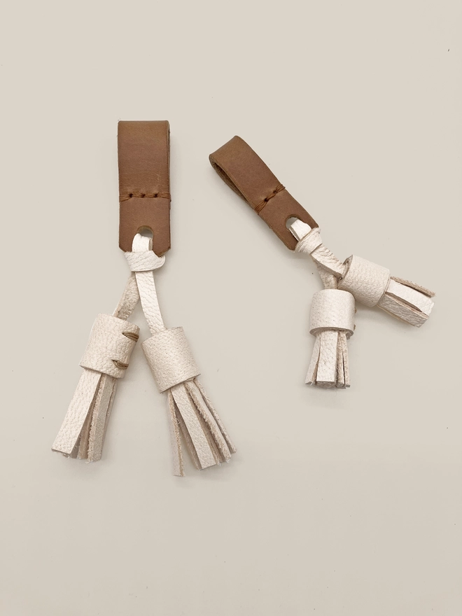 2 caramel leather tassels for dog collar