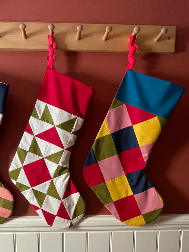 Harlequin Patchwork Stocking, hanging. 