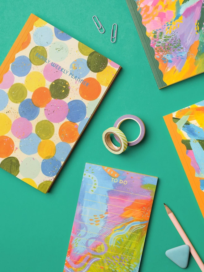 Flatlay of other colourful stationery items from the Raspberry Blossom ‘Happiness’ collection