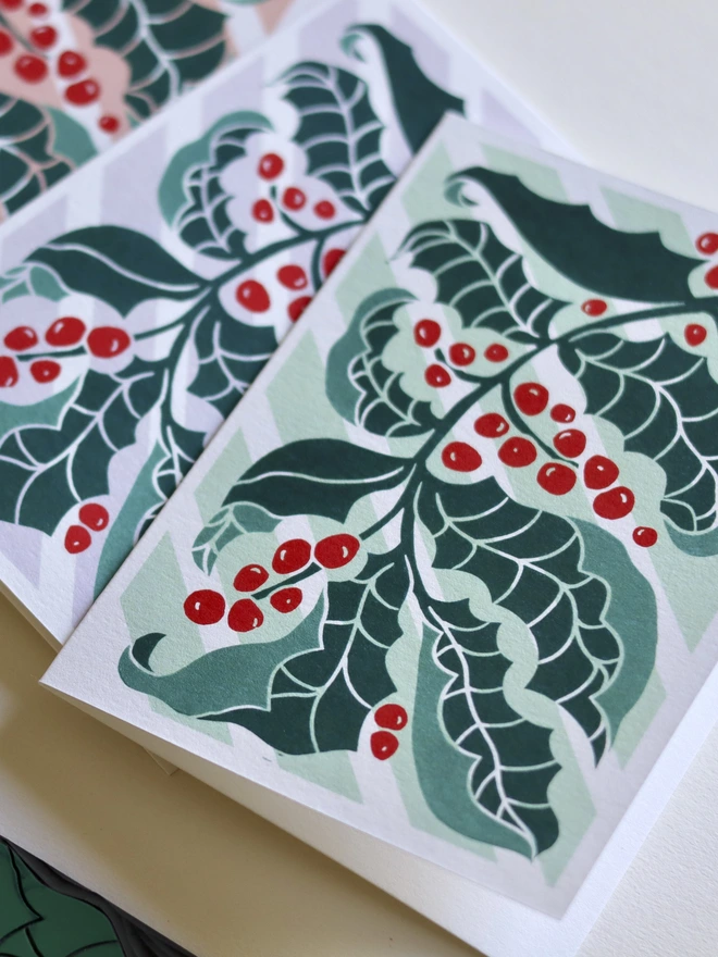 colourful linocut holly leaves greeting card pack of 4