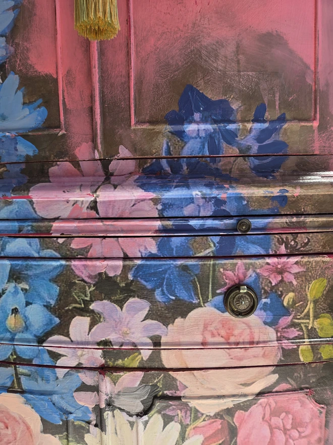 Painted vintage wooden cabinet with pink, blue and floral decoration