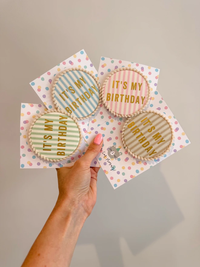 Pastel pink, green, blue and beige ticking striped It's My Birthday Badgess