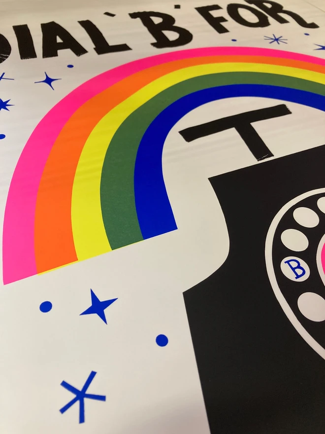'Dial B For Blue Skies' Screenprint, a colourful screenprint outside that says 'Dial b for blue skies'. It depicts a telephone with a rainbow. 