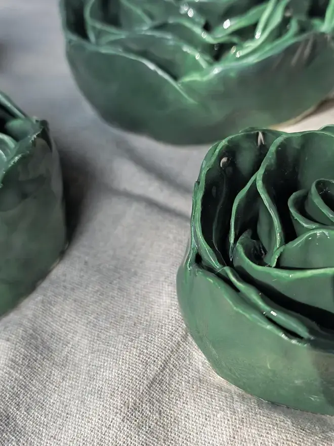 green ceramic rose sculpture