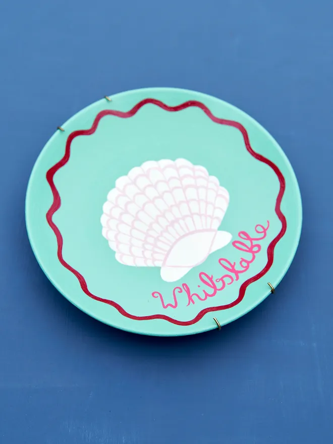 Personalised Blue Seaside Wall Plate with a  hand-drawn Shell