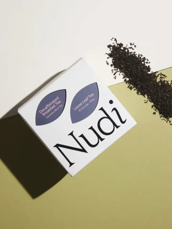 white box of tea with dark blue and black graphic design