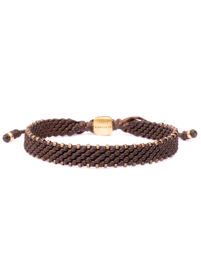 brown rope and bronze bracelet