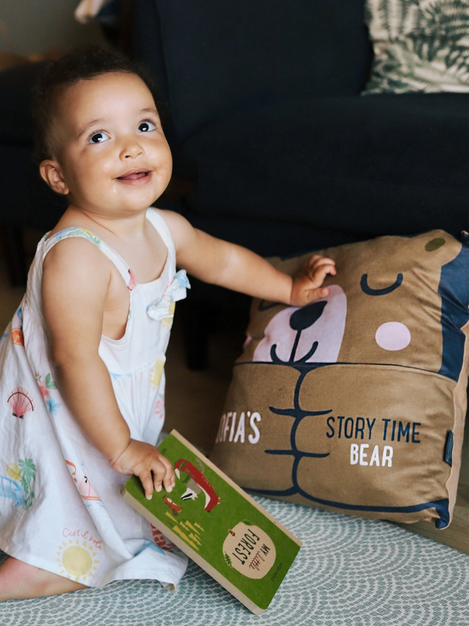 drifting bear story time pocket cushion bear