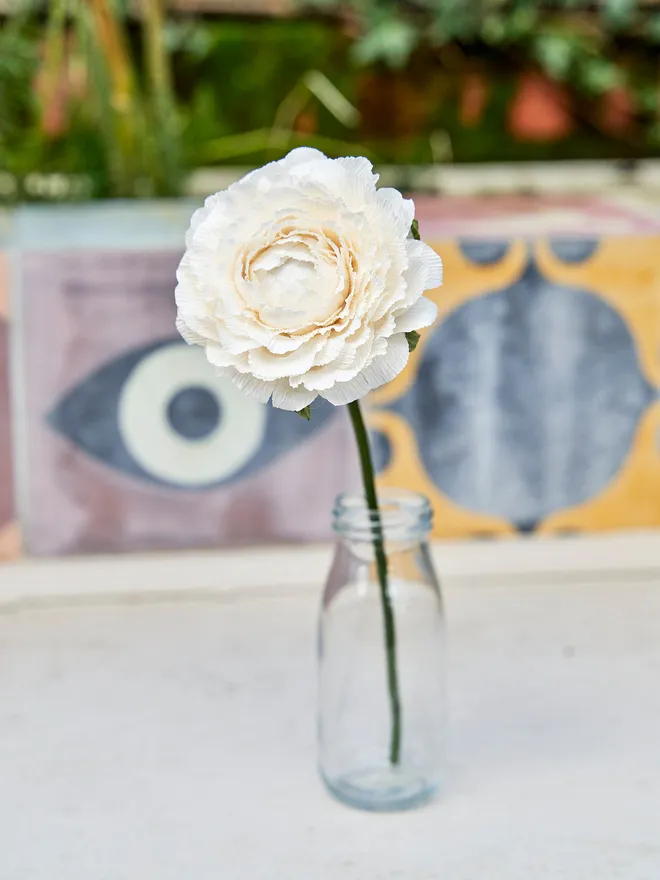 White crepe paper flower