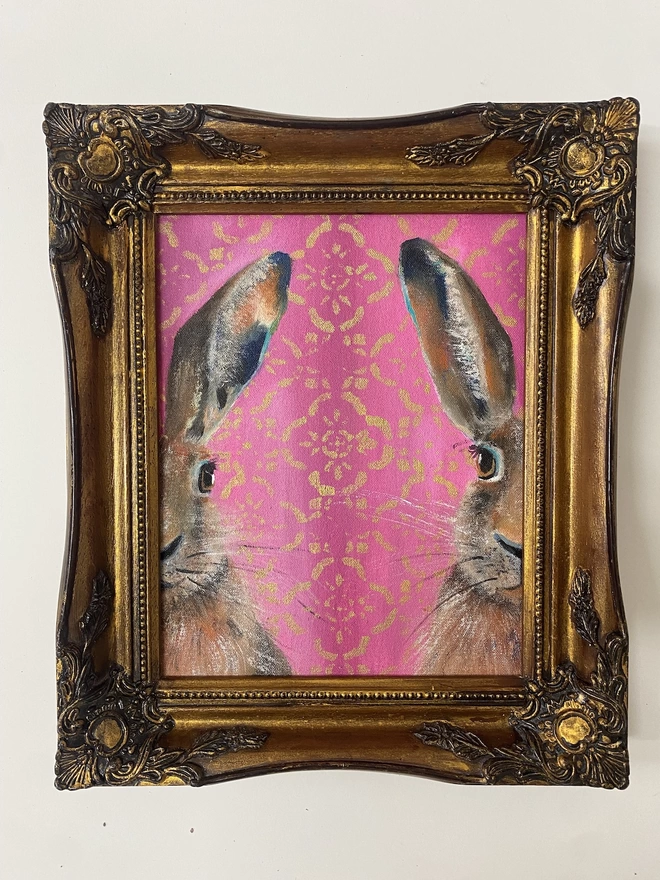 Splitting hares painting in gold frame