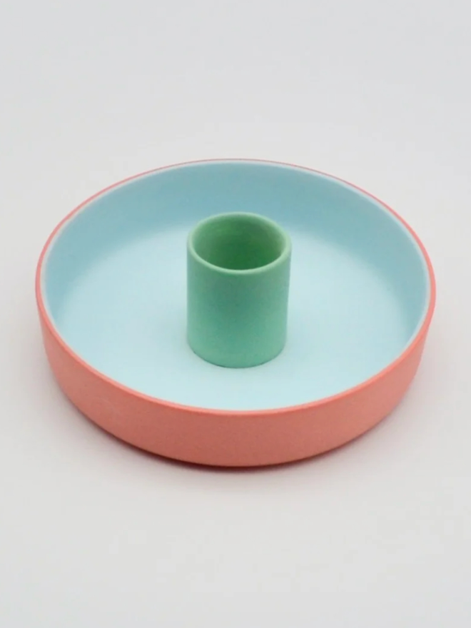Candle Holder. A blue, green and pink candle holder.