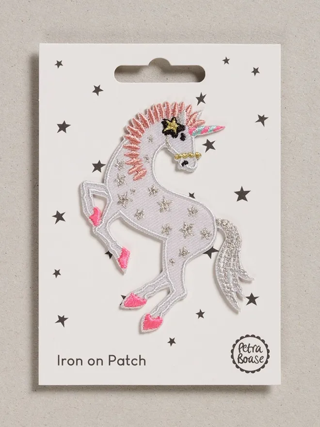 Unicorn iron on embroidered fabric patch. 