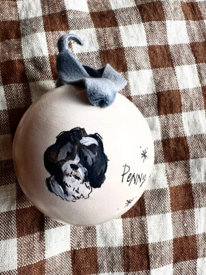 Personalised Illustrated Bauble. A bauble with a personalised illustration.
