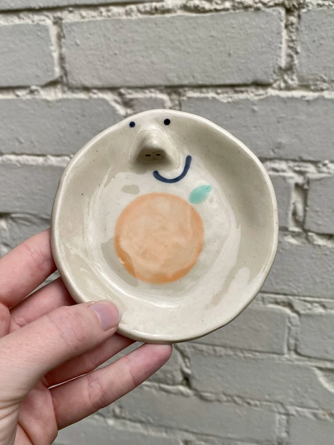 orange trinket tray
