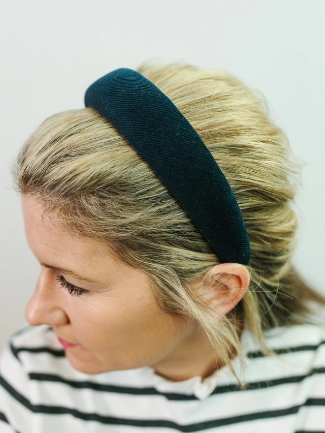 woman in padded corduroy hairband in navy