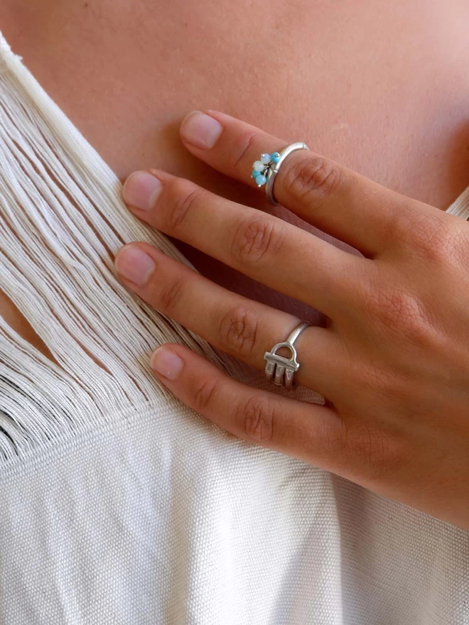 Bamboo bauble ring in sterling silver & turquoise on model