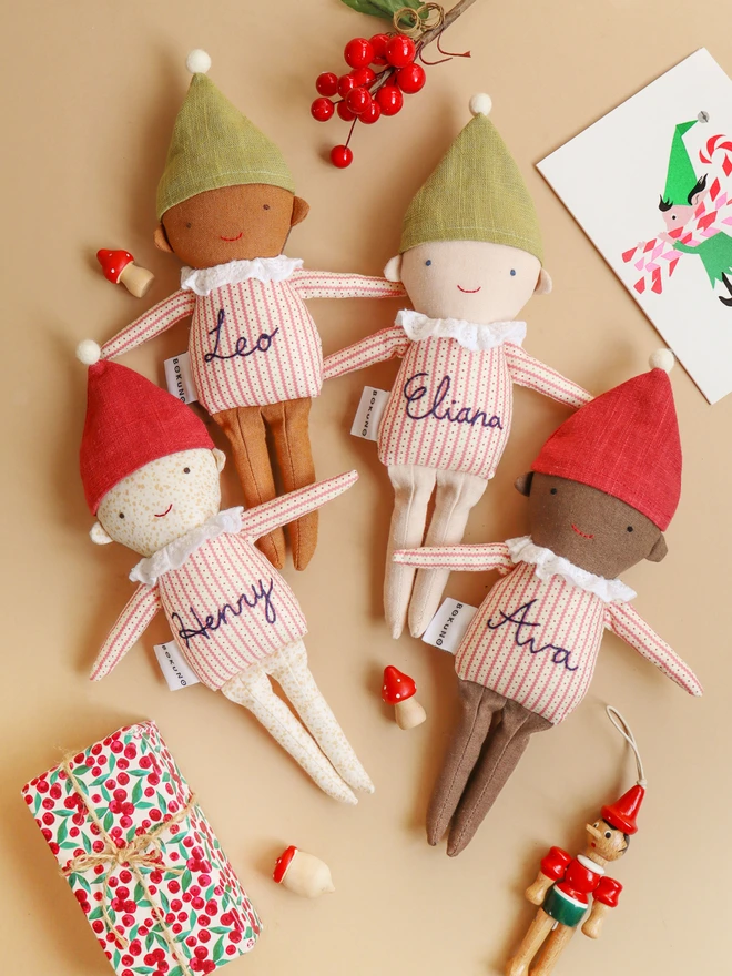 handmade elf dolls in stripe top and red or green hat with a name embroidered