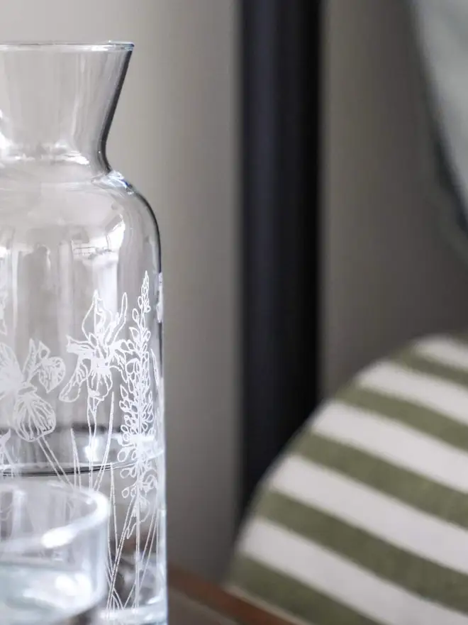 Floral Mini Carafe & Glass Set, on a clear table. 