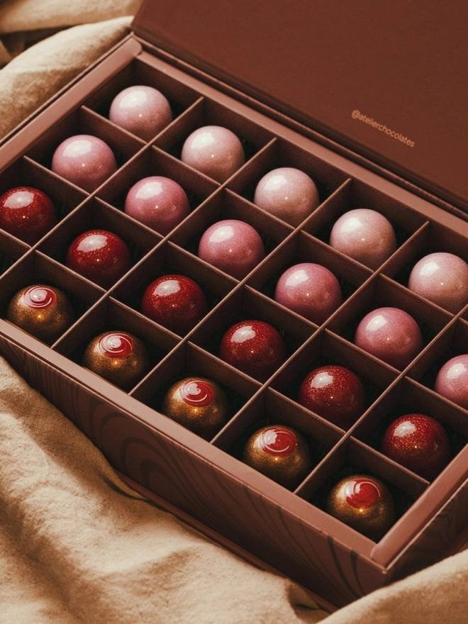 An Atelier Chocolates Valentine's collection of twenty four artisan bon bons.