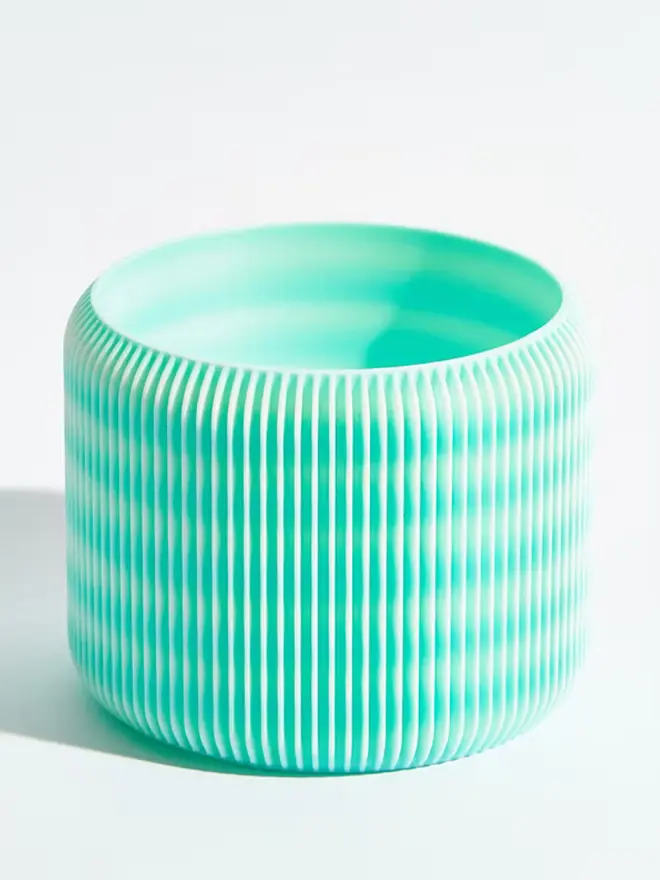 Sustainable 3D Printed Sky Blue Plant Pot, turbin design against a white background.