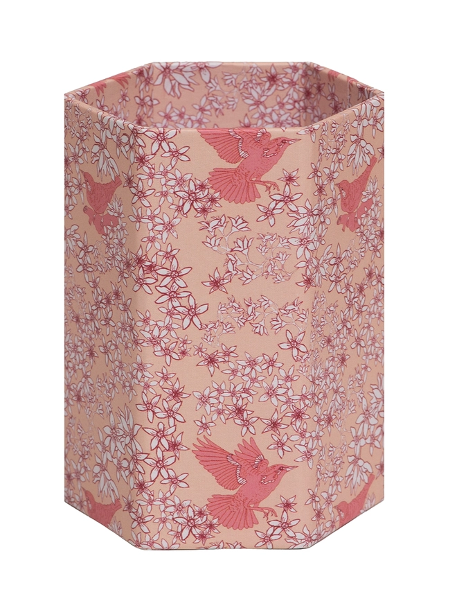 Corali Hexagonal Brush Pot, a colourful patterned pencil pot sitting on a white surface against a plain backdrop.