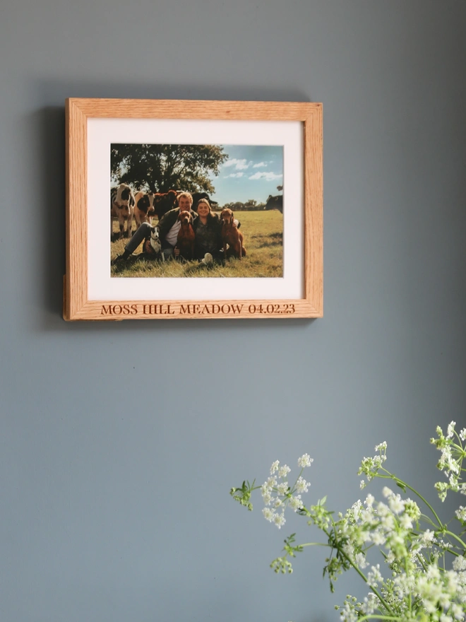 Frame hanging on blue wall