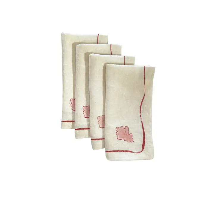 Oak Leaf Napkins (Set of 4). Light cloth napkin, folded and staggered in a white background. 