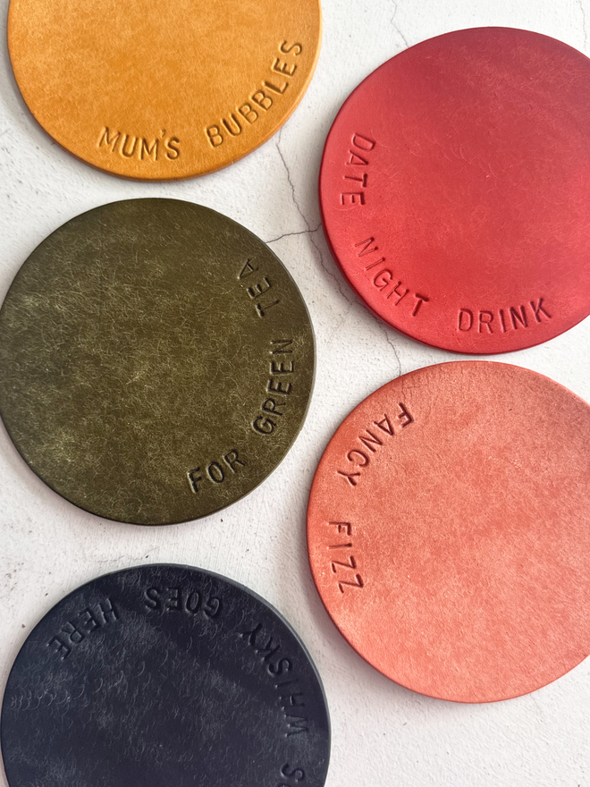 hand stamped leather coasters