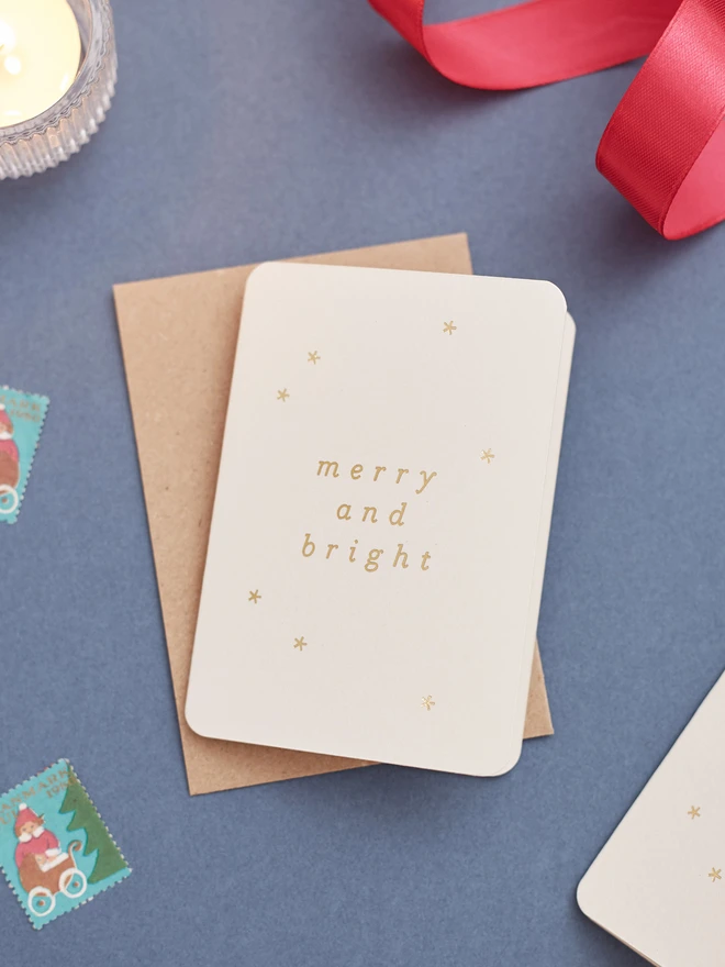 minimal-christmas-card-with-merry-and-bright-gold-foil-lifestyle CC-BRIGHT-GD.jpg