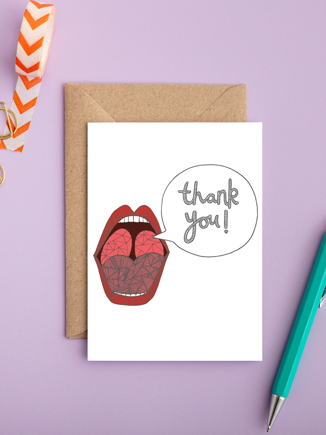A bold thank you card featuring an open mouth 