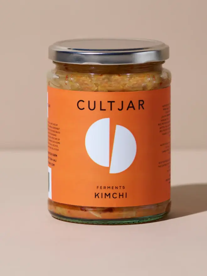 jar of kimchi with orange label