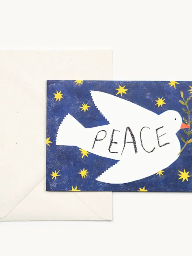 dove card with blue background and 'peace' text