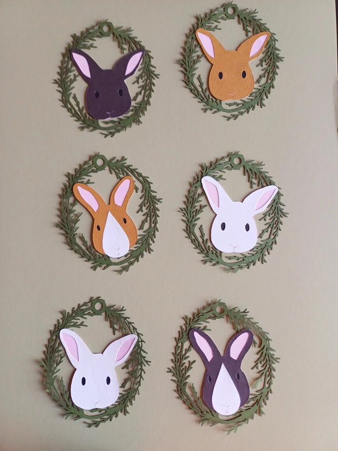 Set of 6 decorations including dark brown, toffee brown, toffee and white, dark brown and white and two white bunny decorations