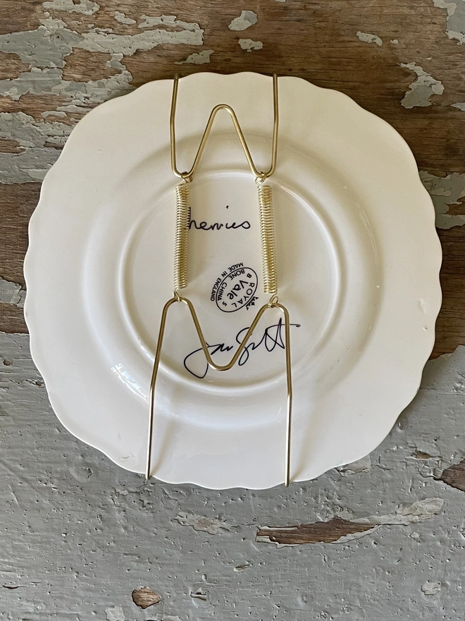 plate hanger on red dotty plate