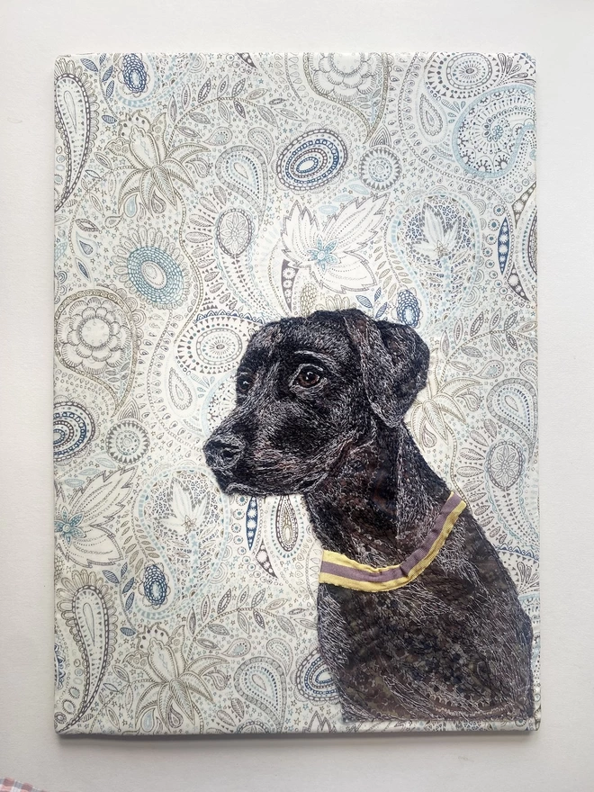 embroidered pet portrait of a black labrador