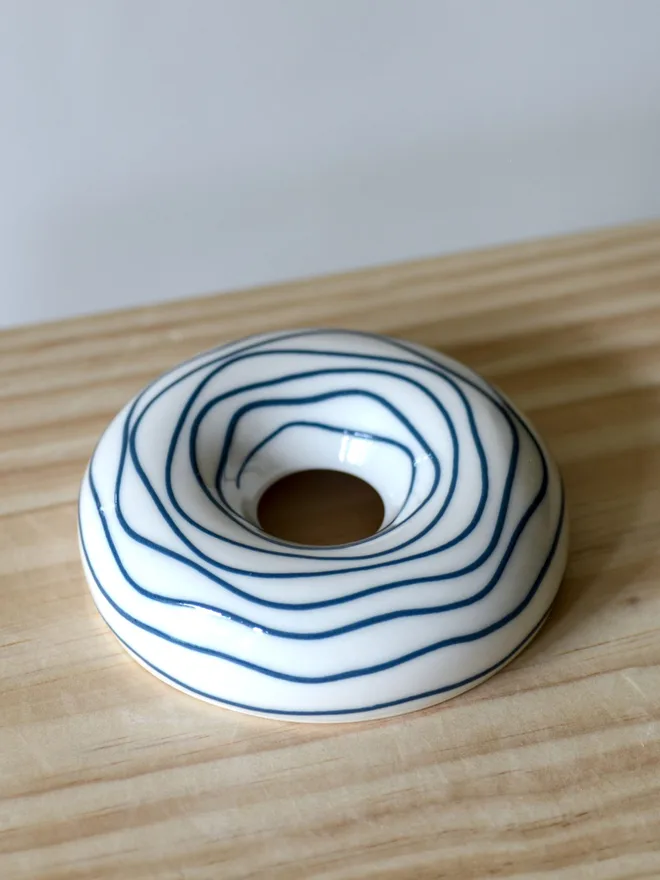 Avocado Planter White & Blue Handmade porcelain avocado planter with carved blue pattern, designed to hold an avocado seed for sprouting