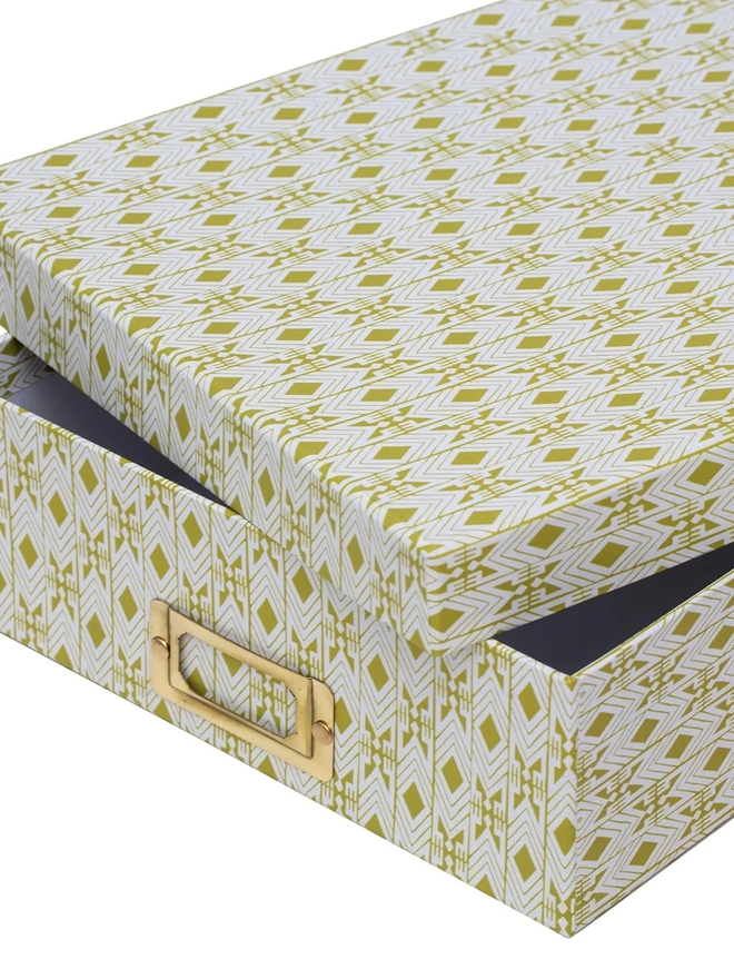 Tijan Lidded Portfolio Box, a colourful portfolio box sitting on a plain surface. 