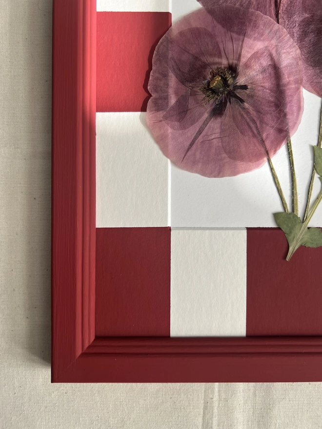 close up of bottom left corner of frame