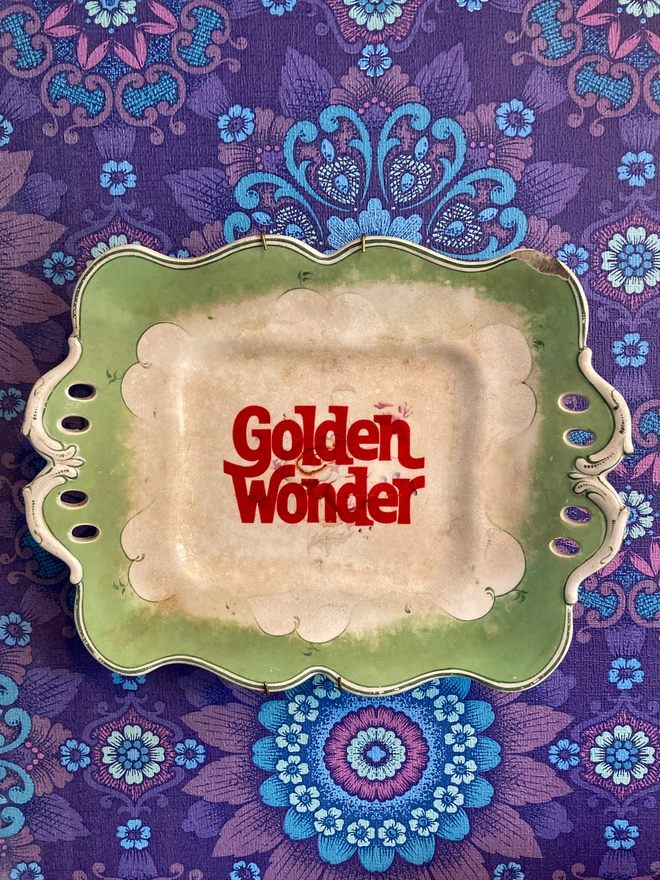 Beautiful rectangular vintage plate featuring a red Golden Wonder logo in the centre.