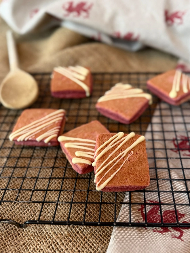 Rhubarb and Custard Welsh Cakes on a cooling rack