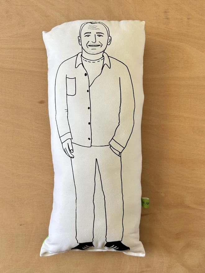 Illustrated cushion featuring Bob Mortimer