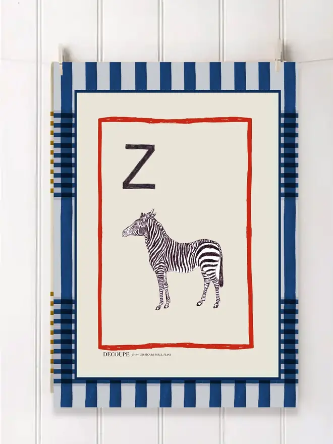 a-z alphabet tea towel. a tea towel with a zebra print and the letter 'z' in the corner.