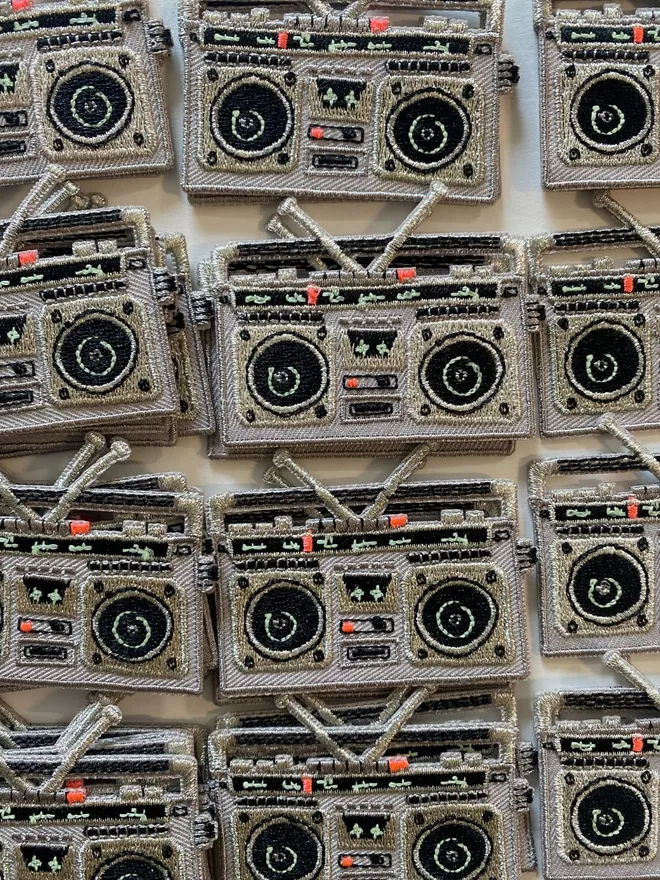 Embroidered retro boombox iron on fabric patch.