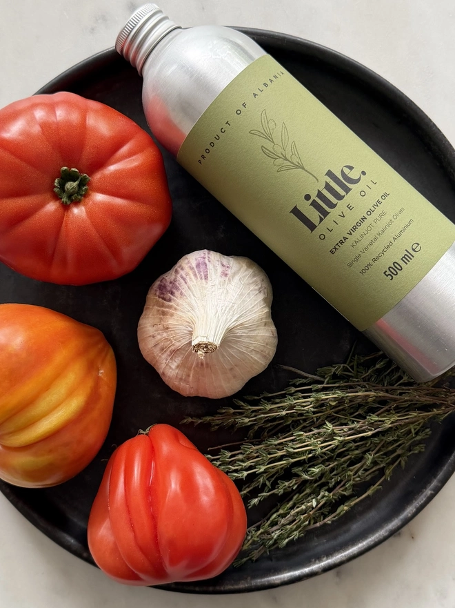 kalinjot extra virgin olive oil and tomatoes, garlic