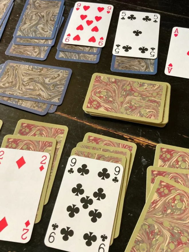 Playing Cards. A spread of cards with both colours available shown.