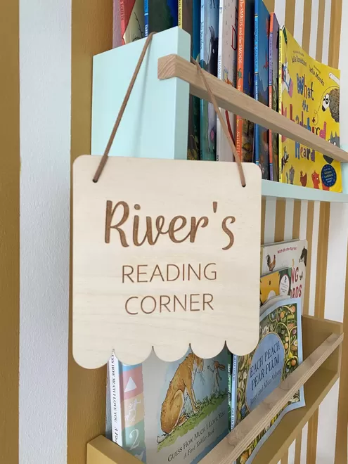 A personalised lasered wooden River’s reading corner  sign