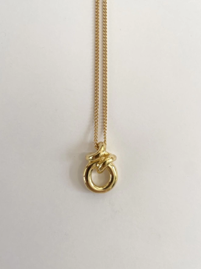 A stunning tubular gold pendant ideal for layering with othernecklaces