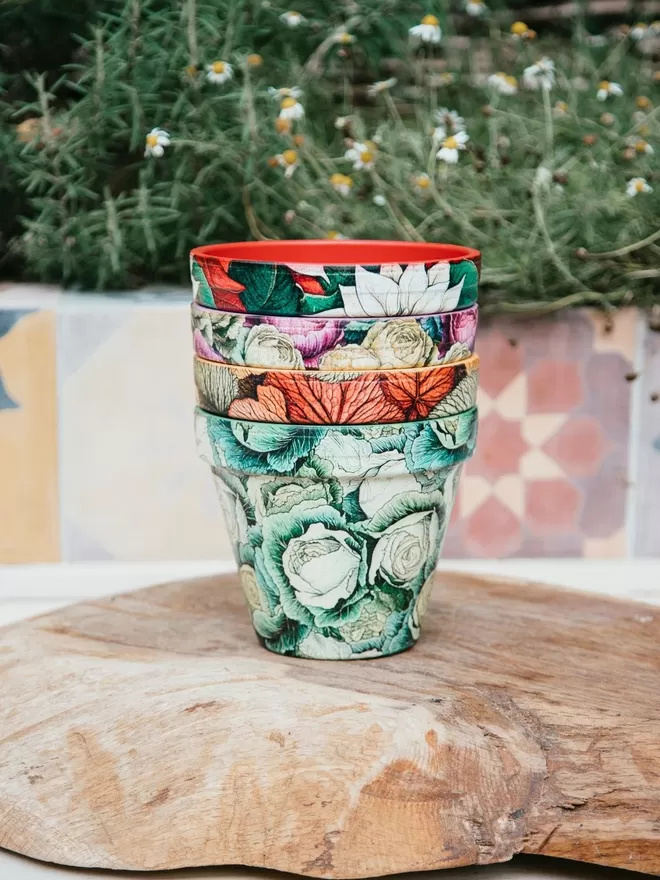 Stack of potily plant pots on a wooden block