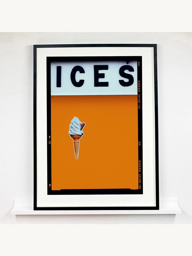 Ices orange artwork large framed in black
