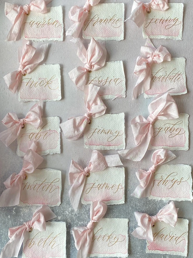 Watercolour wash blush pink placecards